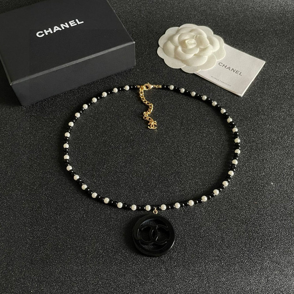 Double-C Emblem Pearl-Detail Pendant Necklace – Pearl Detail – Design 099 detail view