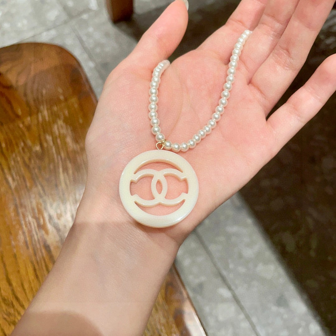 Double-C Emblem Pearl-Detail Pendant Necklace – Pearl Detail – Design 098 side detail