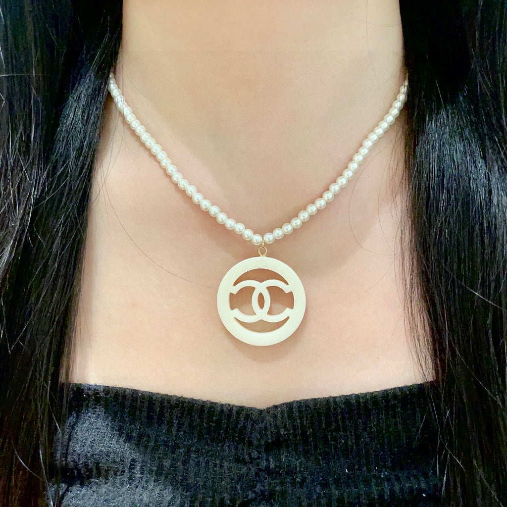 Double-C Emblem Pearl-Detail Pendant Necklace – Pearl Detail – Design 098 detail view