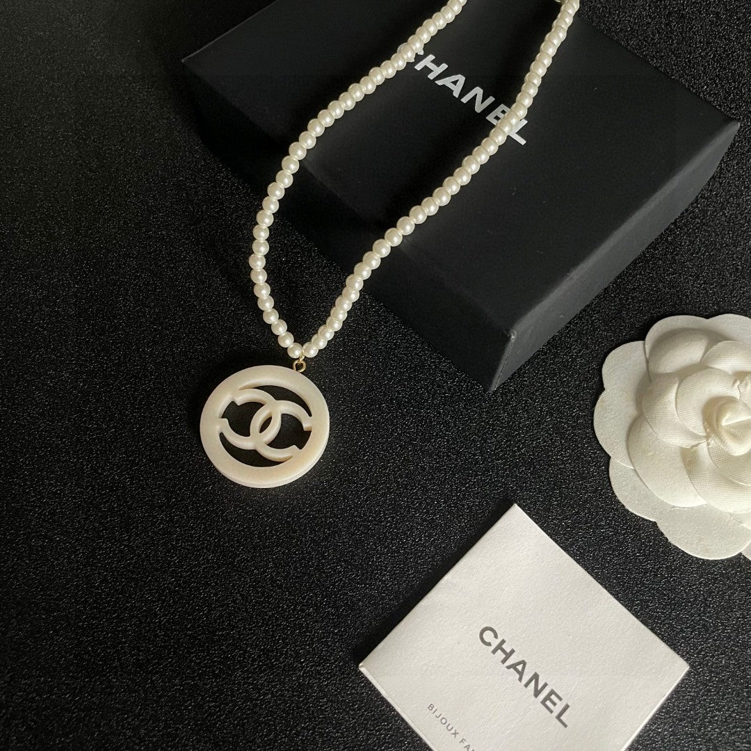 Double-C Emblem Pearl-Detail Pendant Necklace – Pearl Detail – Design 005 close-up detail