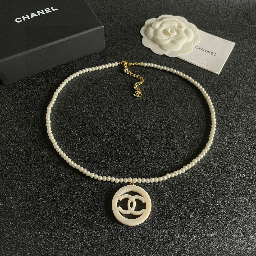 Double-C Emblem Pearl-Detail Pendant Necklace – Pearl Detail – Design 098 detail view