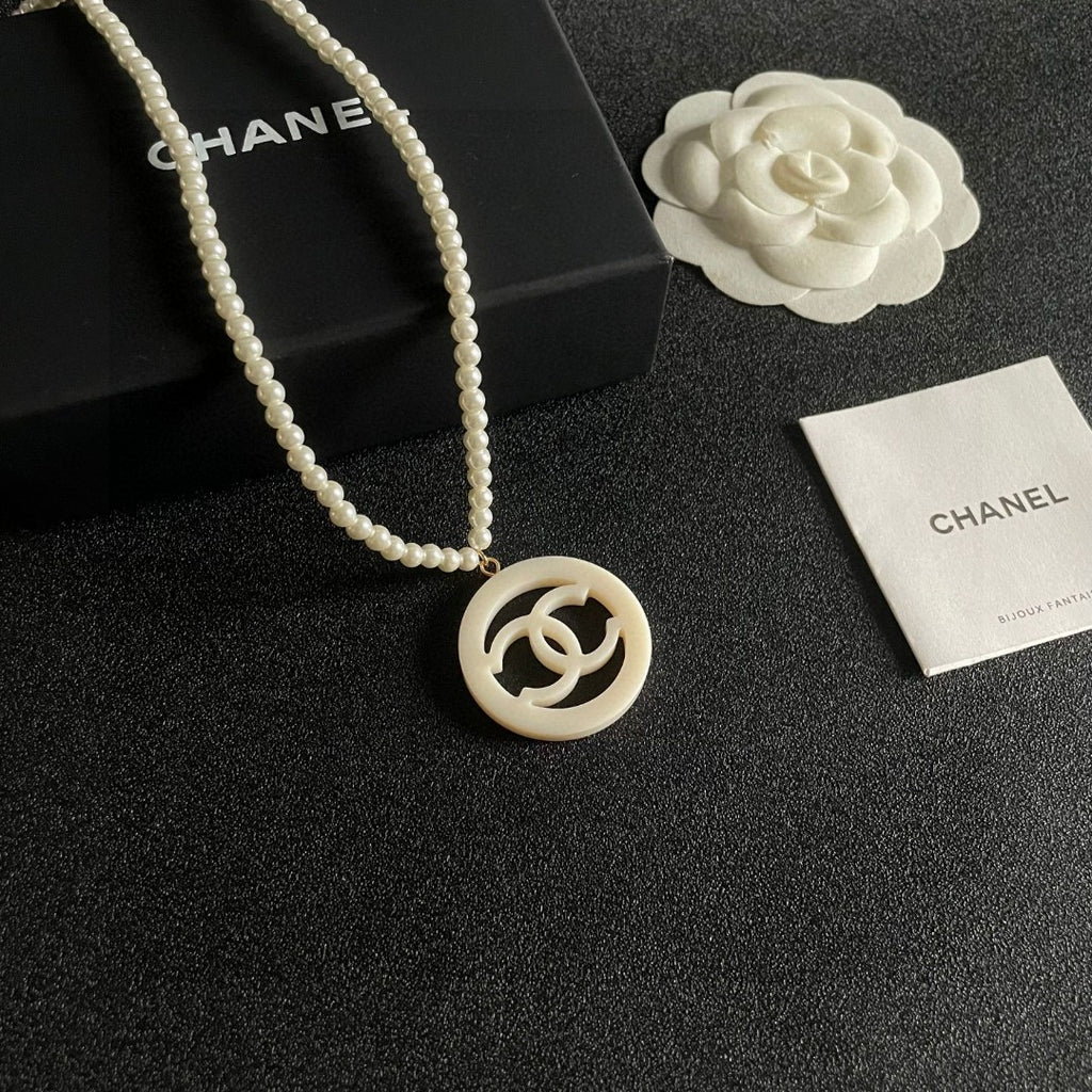 Double-C Emblem Pearl-Detail Pendant Necklace – Pearl Detail – Design 098 styled product view