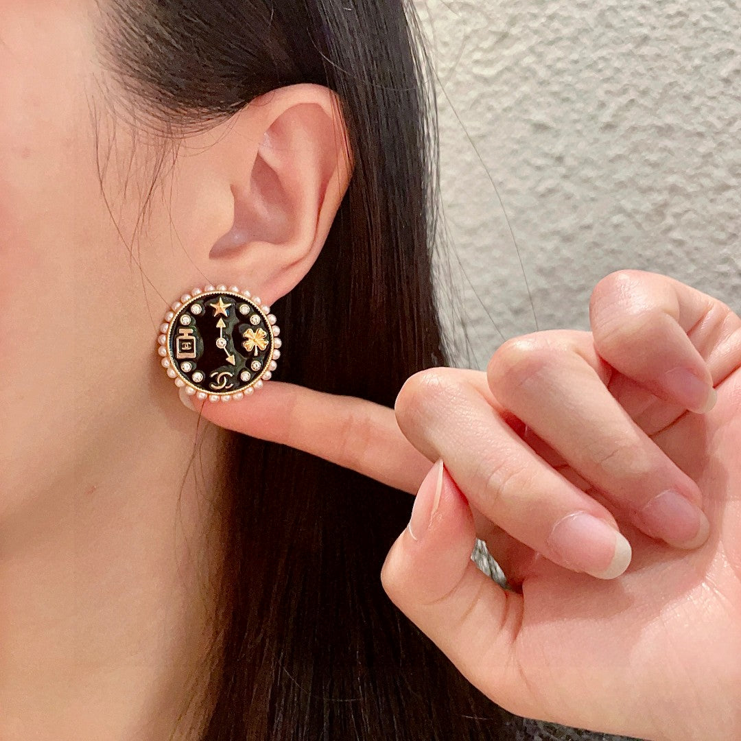 Double-C Emblem Stud Earrings in Polished Metal-Tone – Design 346 front product view