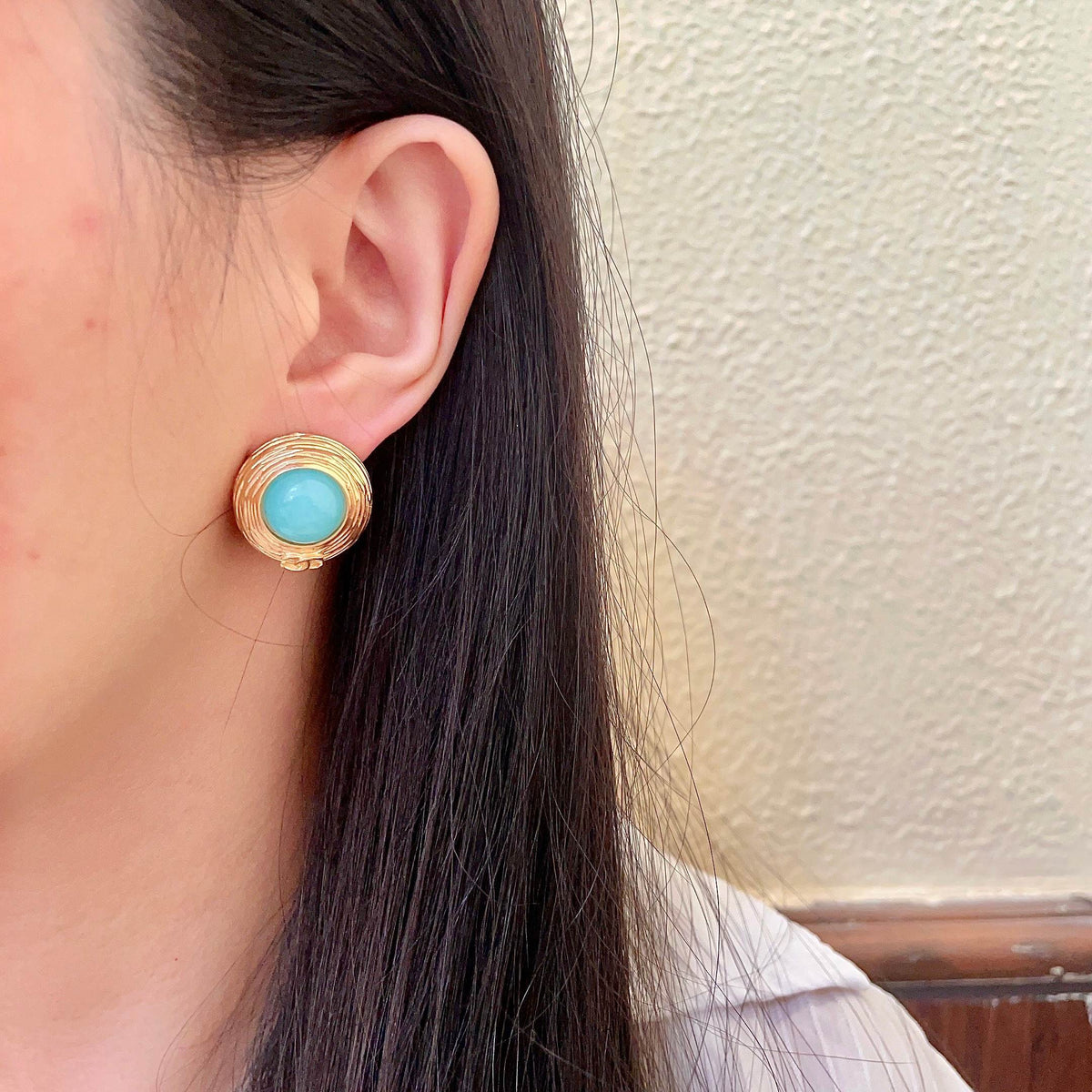 Double-C Emblem Stud Earrings in Polished Metal-Tone – Design 280 detail view
