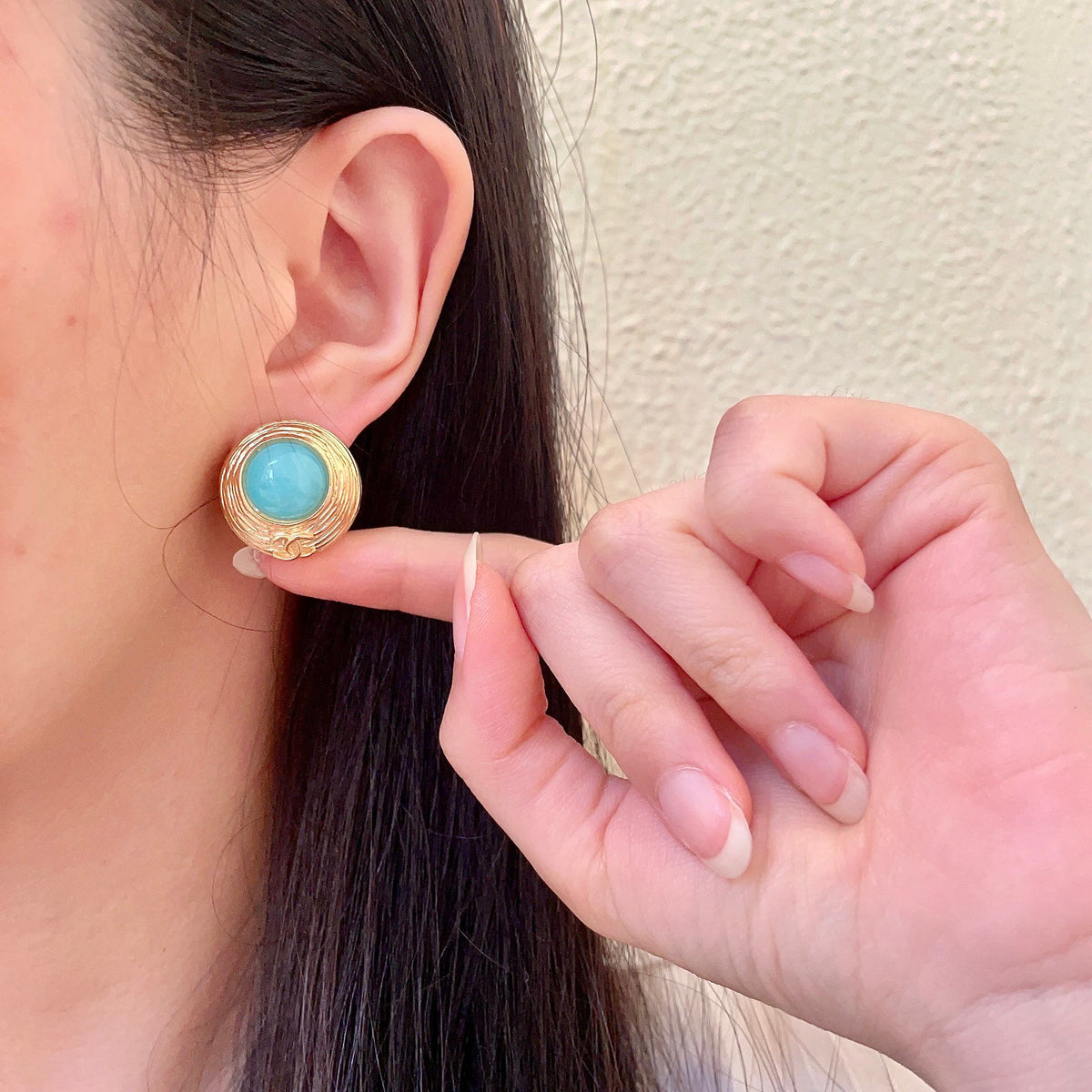 Double-C Emblem Stud Earrings in Polished Metal-Tone – Design 341 front product view