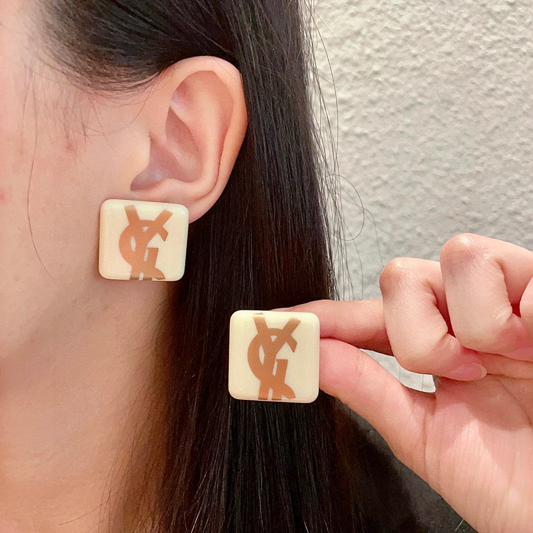 Letter Emblem Stud Earrings in Polished Metal-Tone – Design 015 main product view