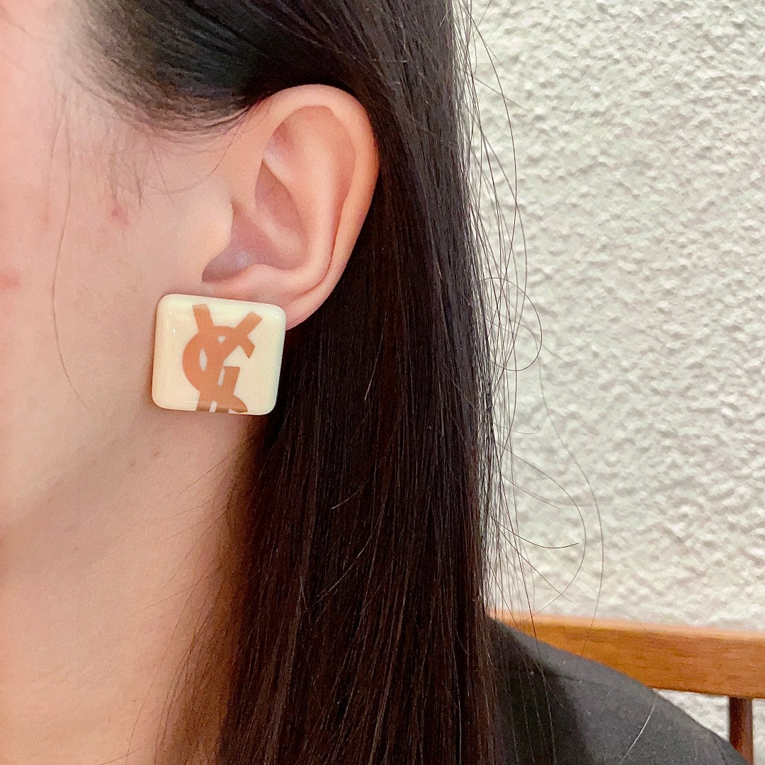 Letter Emblem Stud Earrings in Polished Metal-Tone – Design 015 detail view