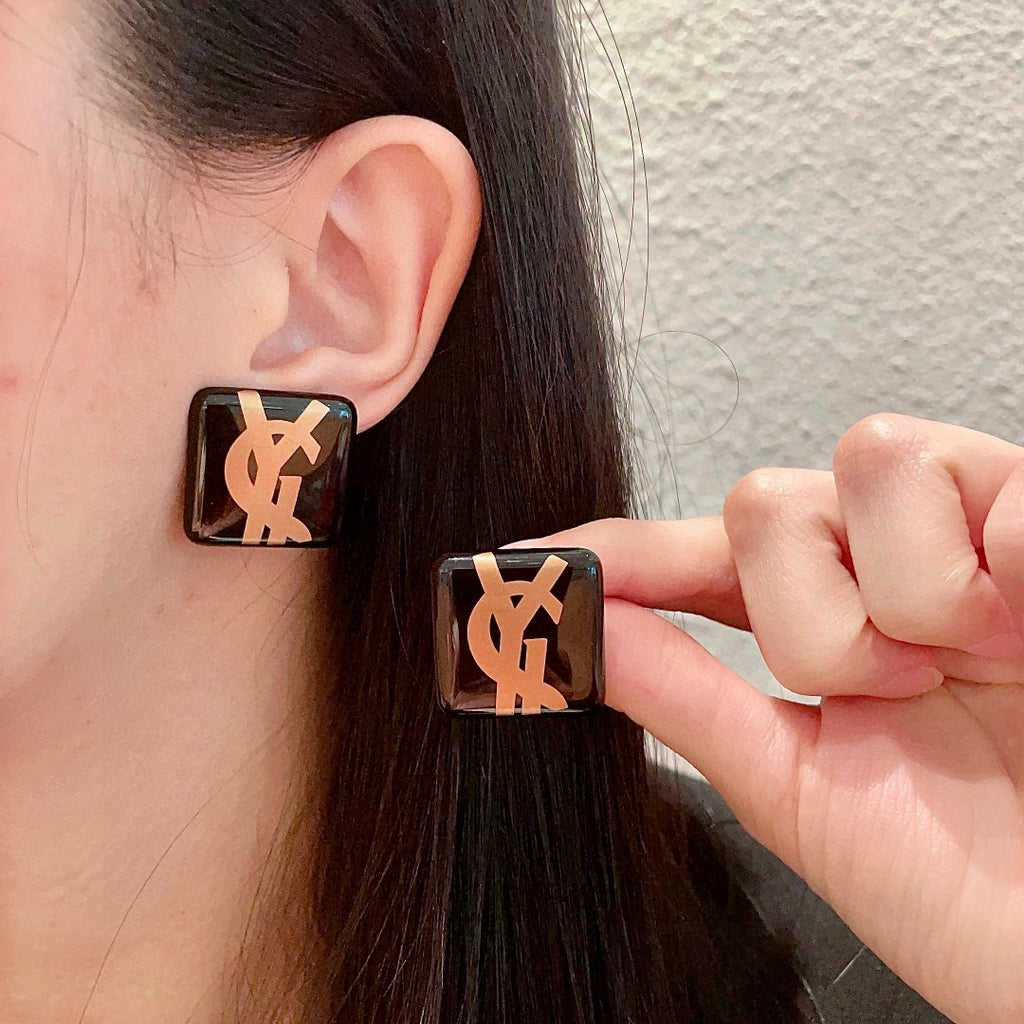 Letter Emblem Stud Earrings in Polished Metal-Tone – Design 011 main product view