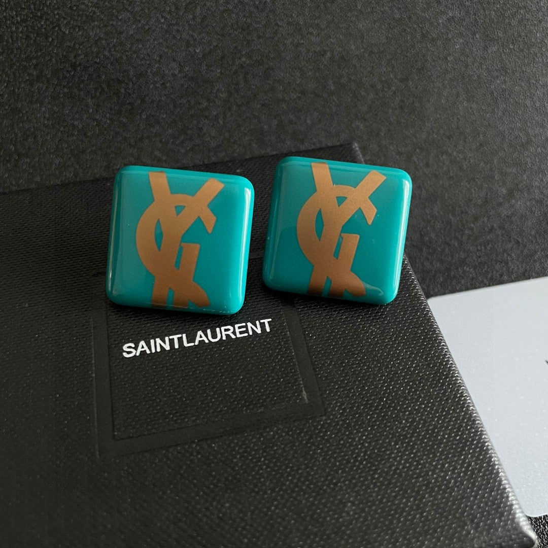 Letter Emblem Stud Earrings in Polished Metal-Tone – Design 016 detail view