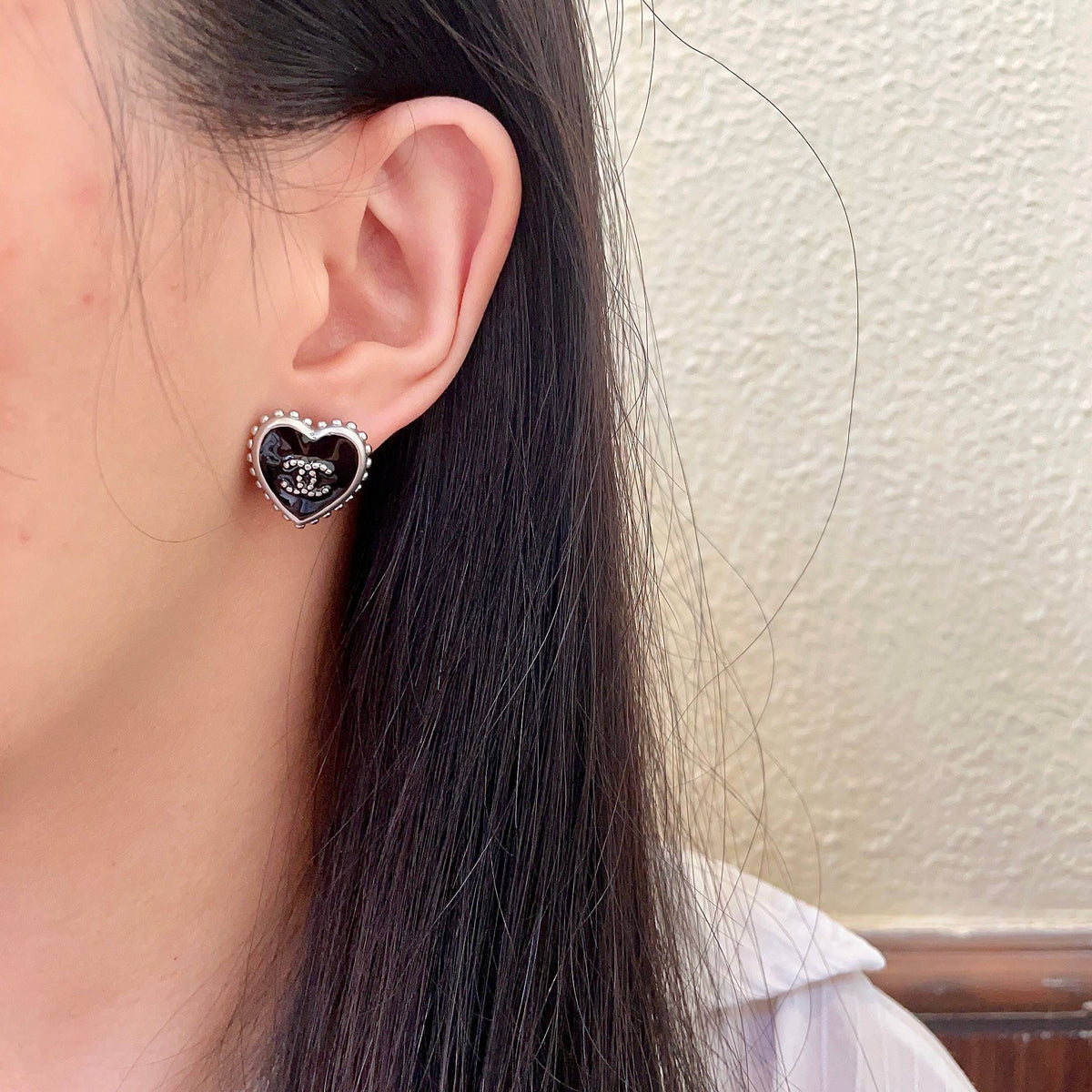Double-C Emblem Stud Earrings in Polished Metal-Tone – Heart Detail – Design 010 detail view
