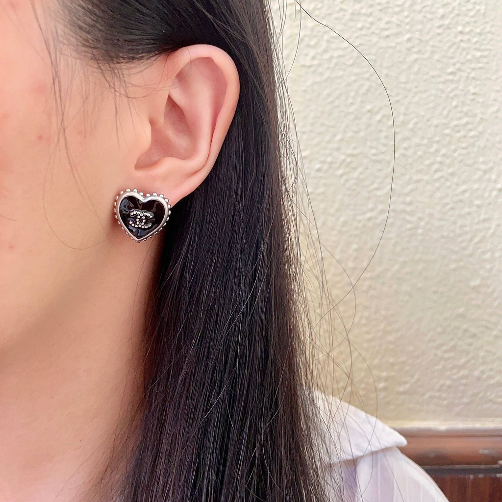 Double-C Emblem Stud Earrings in Polished Metal-Tone – Heart Detail – Design 012 detail view