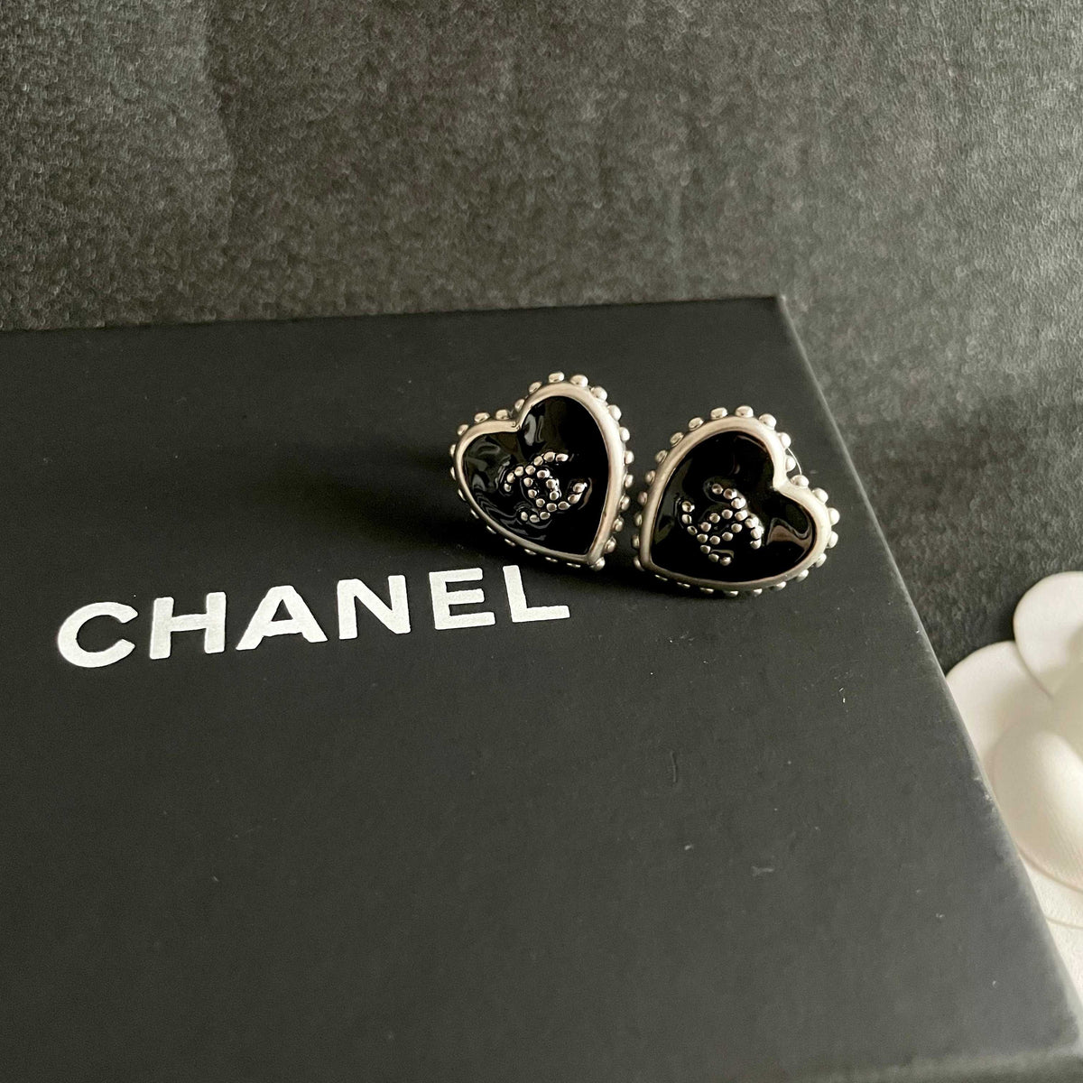 Double-C Emblem Stud Earrings in Polished Metal-Tone – Heart Detail – Design 010 detail view