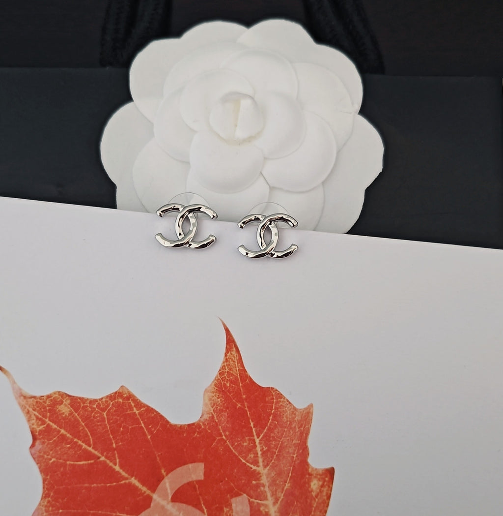 Signature Emblem Stud Earrings in Gold-Tone – White Detail – Design 002 close-up detail