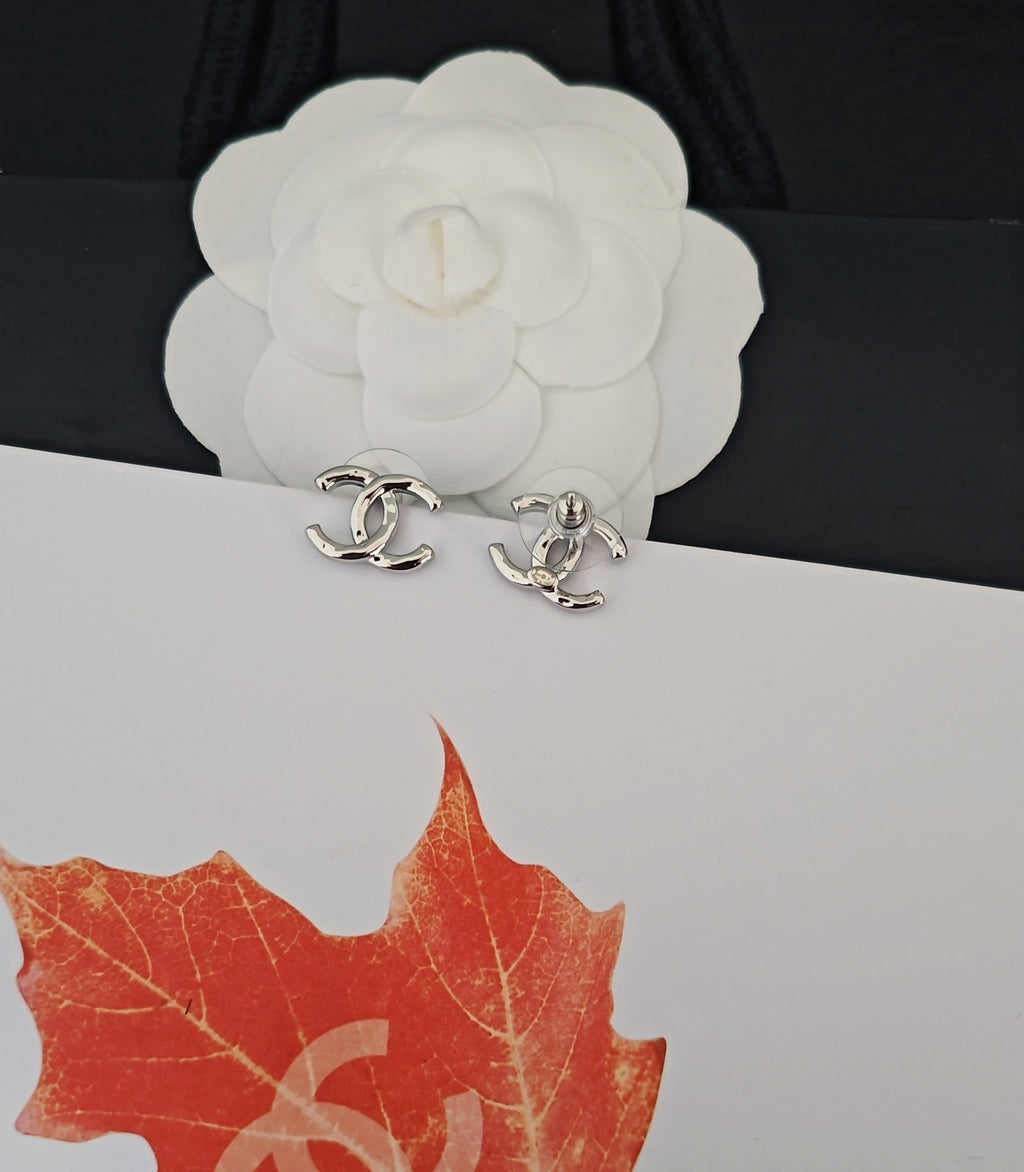 Signature Emblem Stud Earrings in Gold-Tone – White Detail – Design 002 styled product view