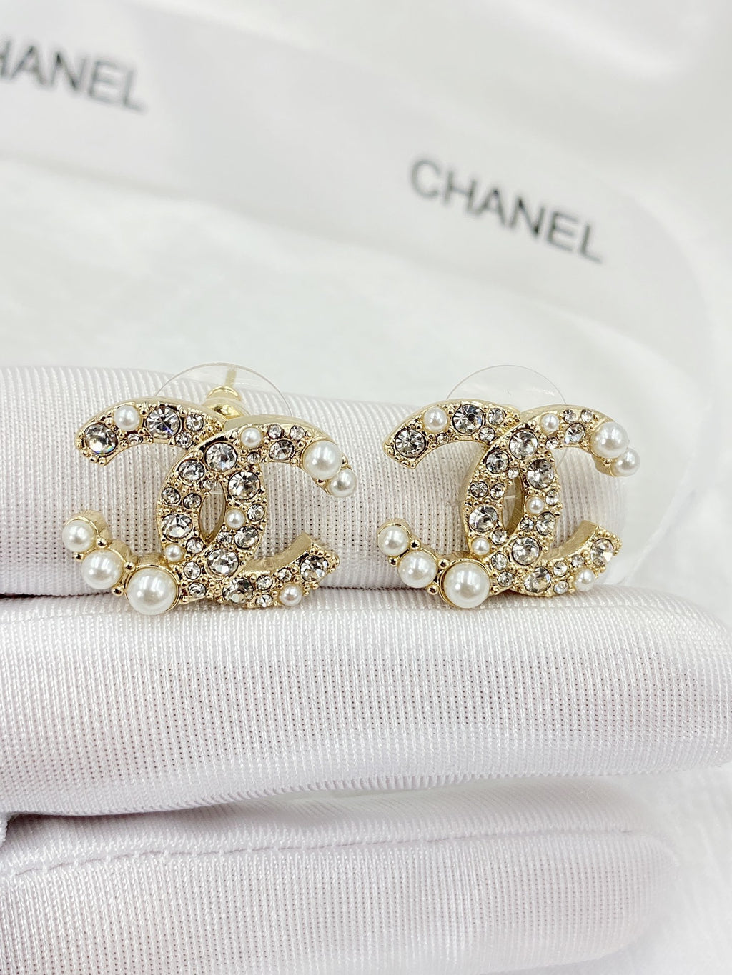 Double-C Emblem Pearl-Detail Stud Earrings – Pearl Detail – Design 007 close-up detail