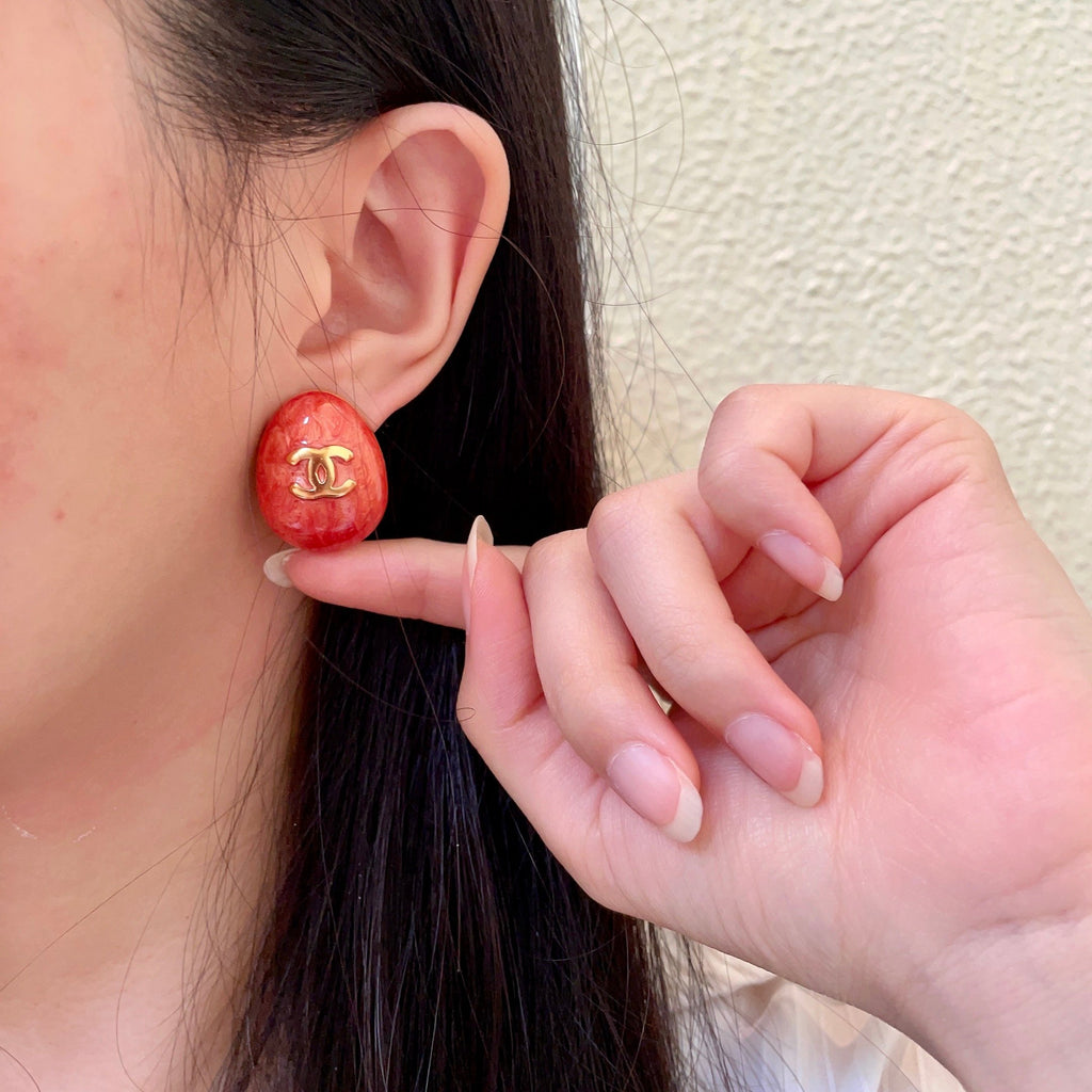 Double-C Emblem Stud Earrings in Polished Metal-Tone – Design 345 front product view