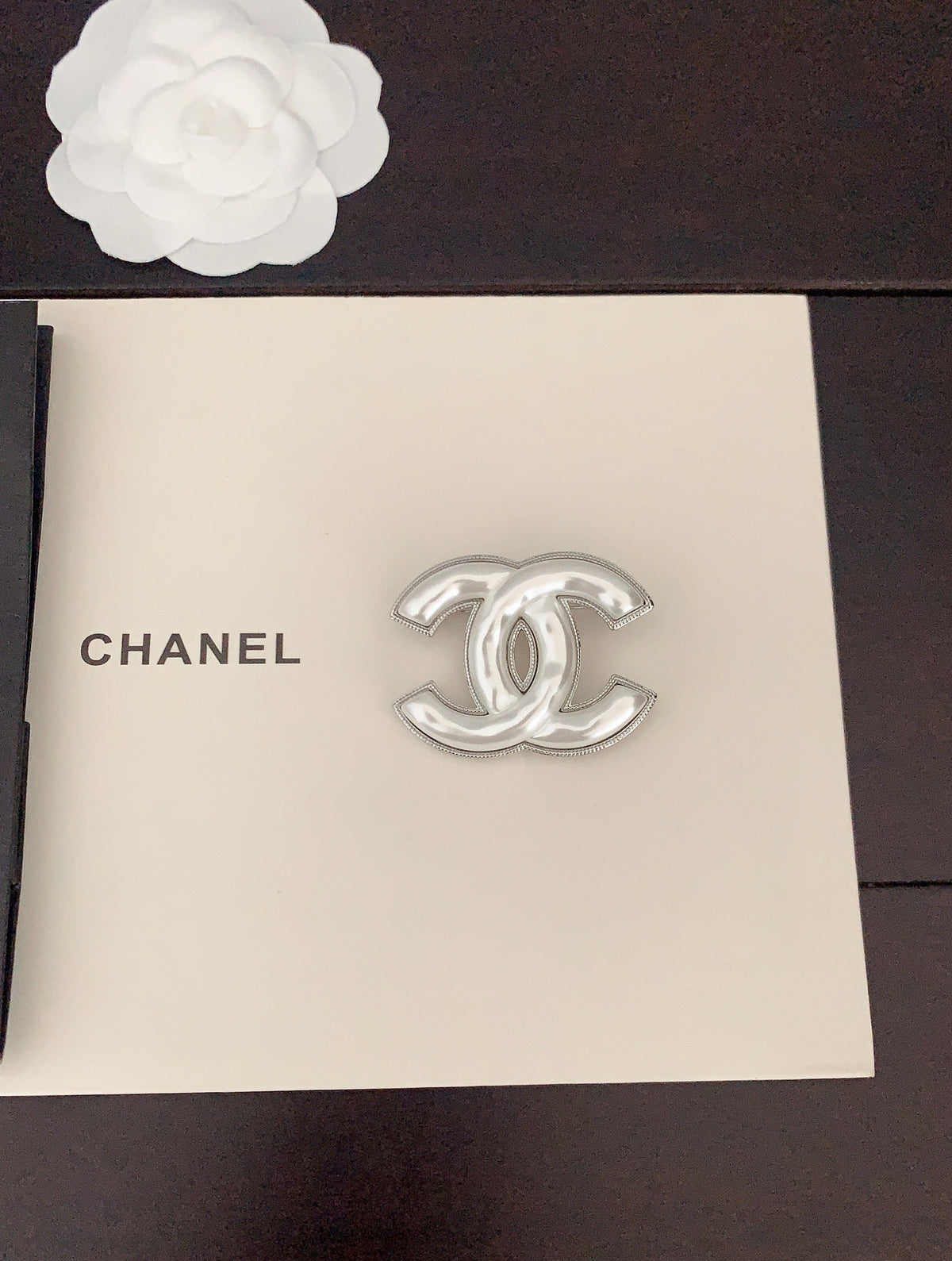 Signature Emblem Brooch in Gold-Tone – White Detail detail view