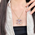 Double-C Emblem Pendant Necklace in Polished Metal-Tone – Design 061 main product view
