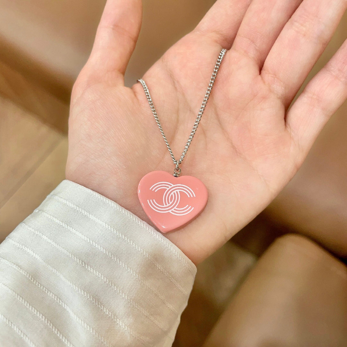 Double-C Emblem Pendant Necklace in Polished Metal-Tone – Heart Detail – Design 007 side detail