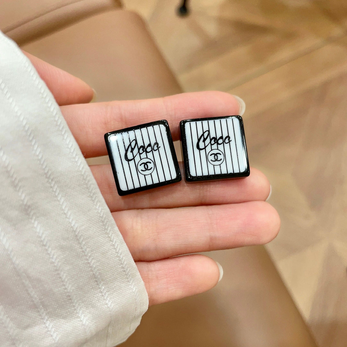 Double-C Emblem Stud Earrings in Polished Metal-Tone – Design 367 side detail