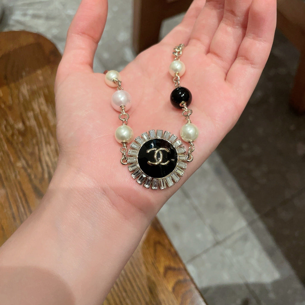 Double-C Emblem Pearl-Detail Pendant Necklace – Pearl Detail – Design 036 side detail