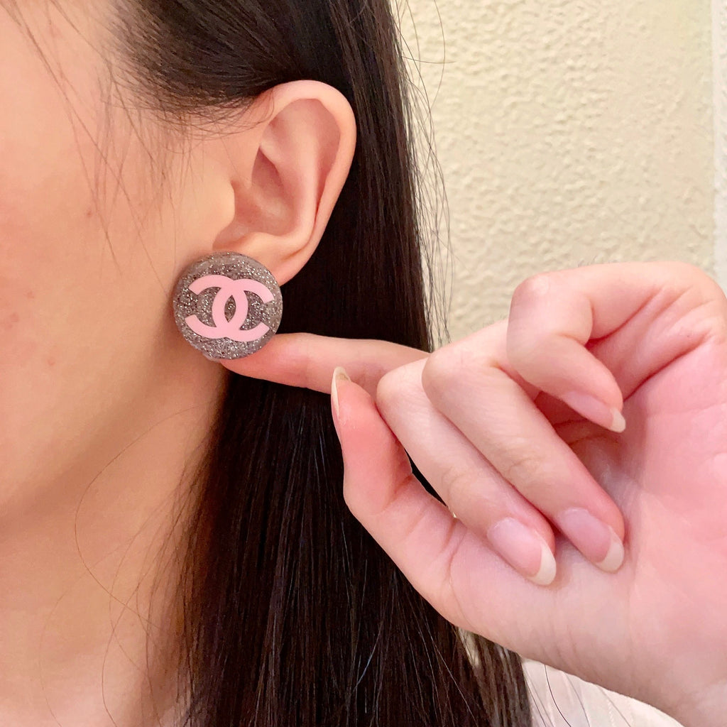 Double-C Emblem Stud Earrings in Polished Metal-Tone – Design 178 front product view