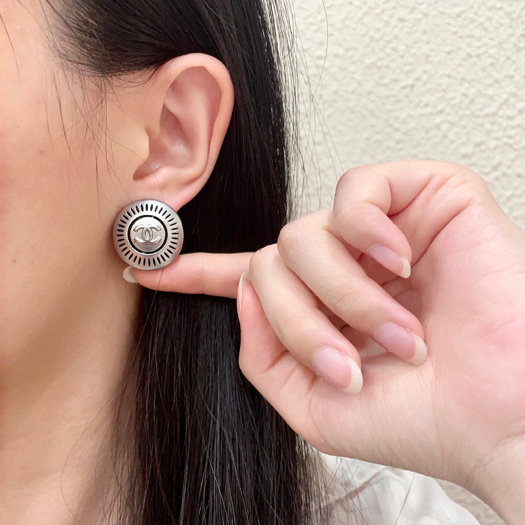 Double-C Emblem Stud Earrings in Polished Metal-Tone – Design 099 front product view
