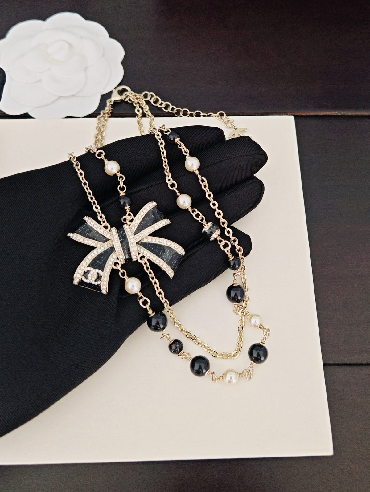 Bow Pendant Necklace in Gold-Tone – Black Detail – Design 002 main product view