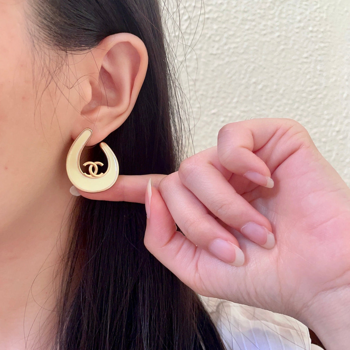 Double-C Emblem Stud Earrings in Polished Metal-Tone – Design 420 front product view