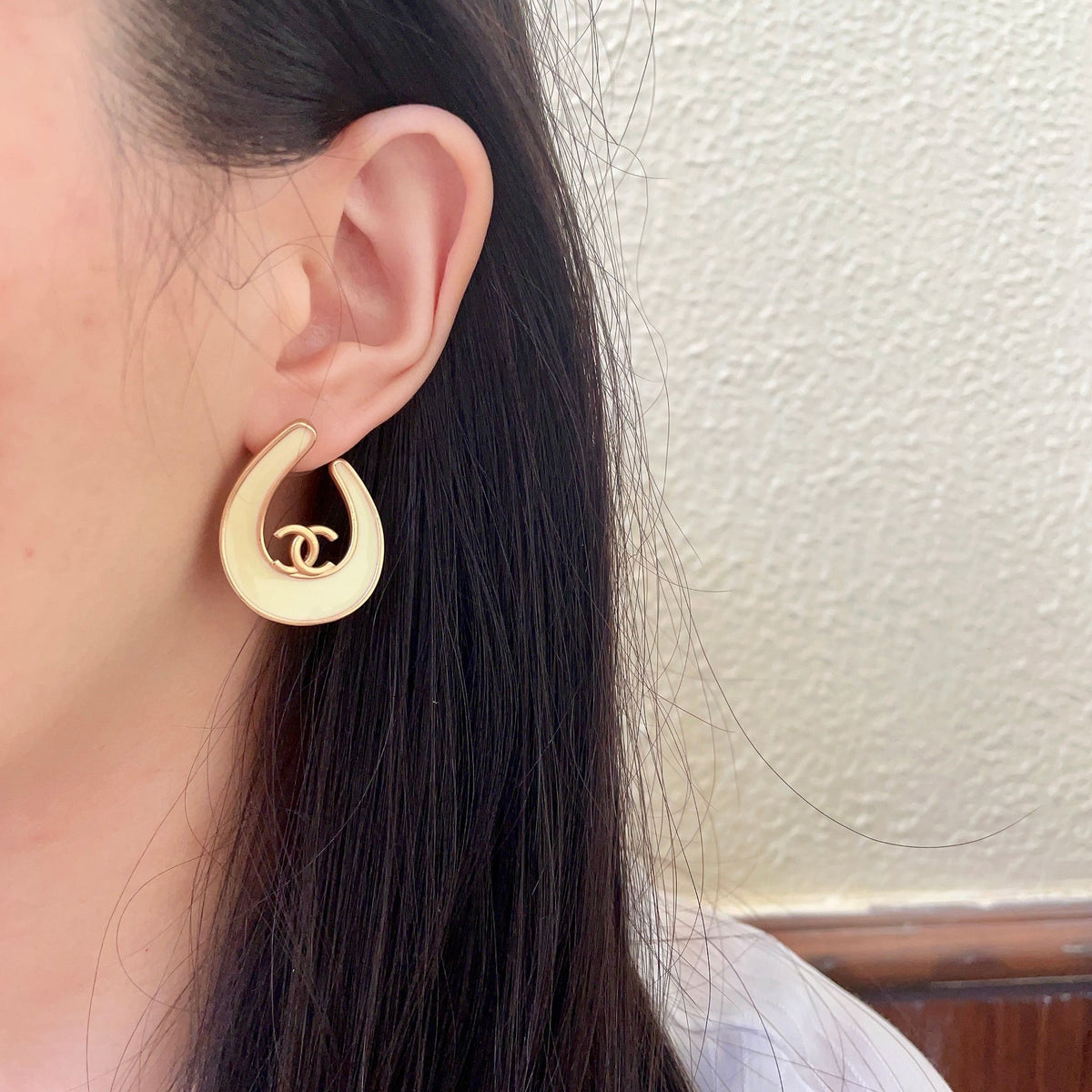 Double-C Emblem Stud Earrings in Polished Metal-Tone – Design 420 detail view