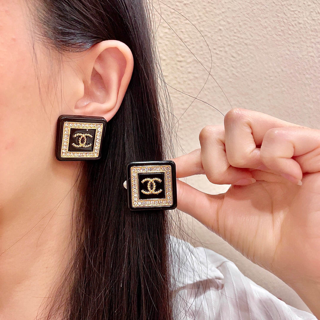 Double-C Emblem Stud Earrings in Polished Metal-Tone – Design 388 main product view
