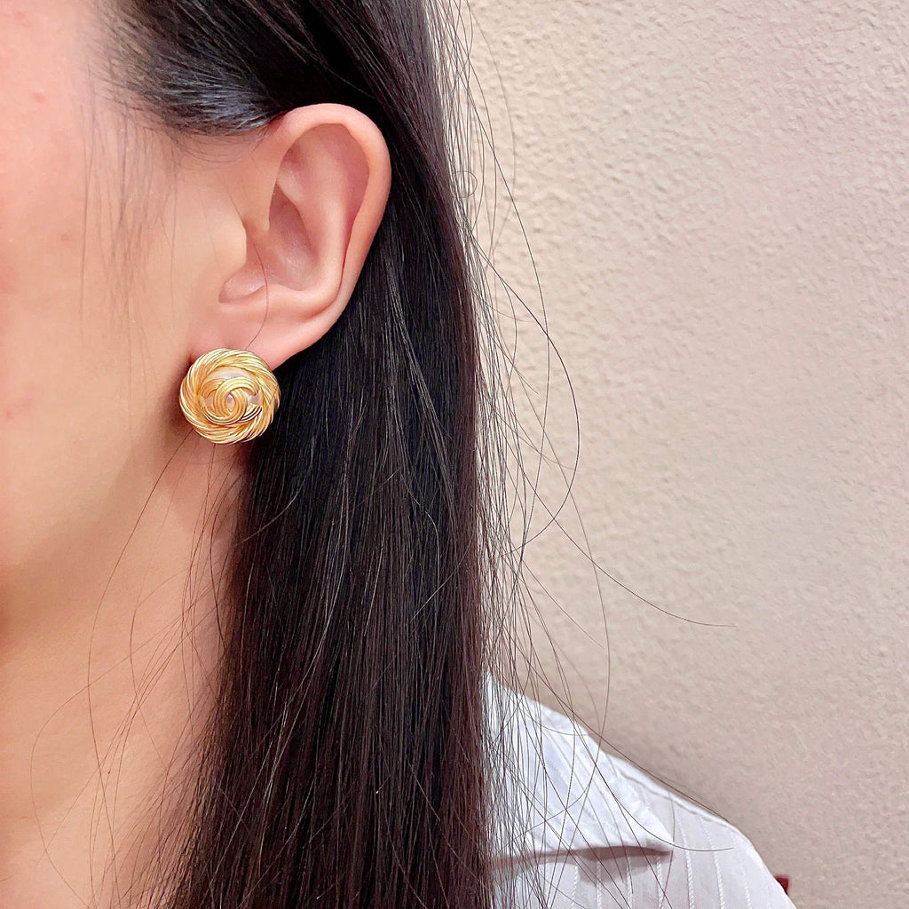 Double-C Emblem Stud Earrings in Polished Metal-Tone – Design 302 detail view