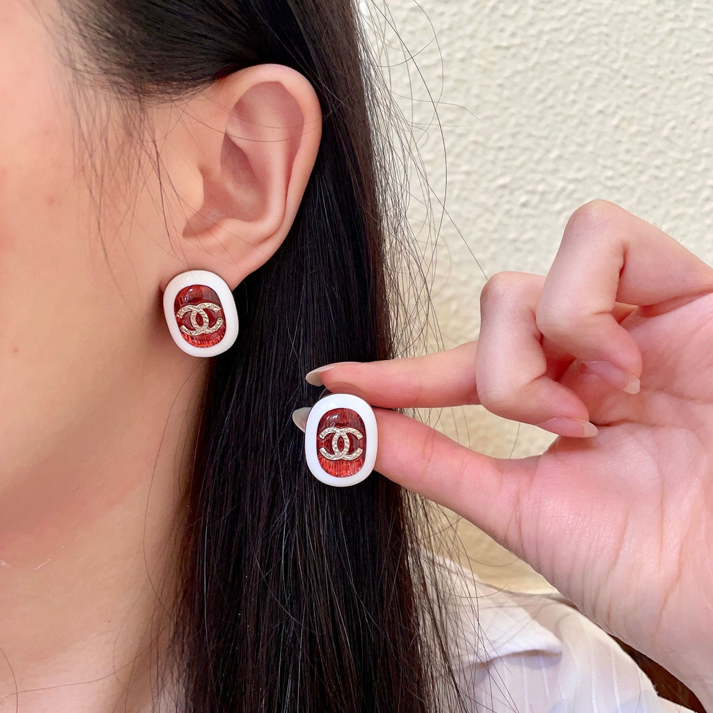 Double-C Emblem Stud Earrings in Polished Metal-Tone – Design 417 main product view