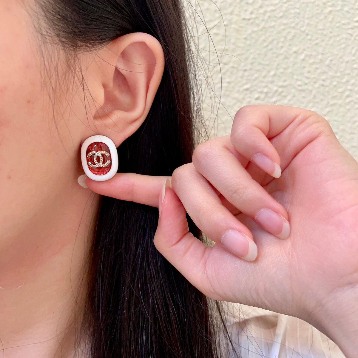 Double-C Emblem Stud Earrings in Polished Metal-Tone – Design 457 front product view