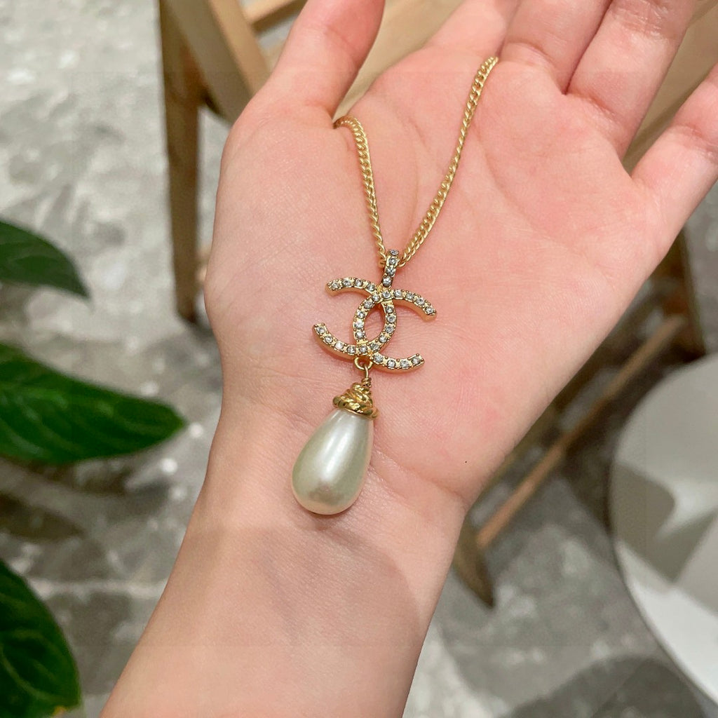 Double-C Emblem Pearl-Detail Pendant Necklace – Pearl Detail – Design 131 side detail