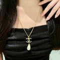Double-C Emblem Pearl-Detail Pendant Necklace – Pearl Detail – Design 131 main product view