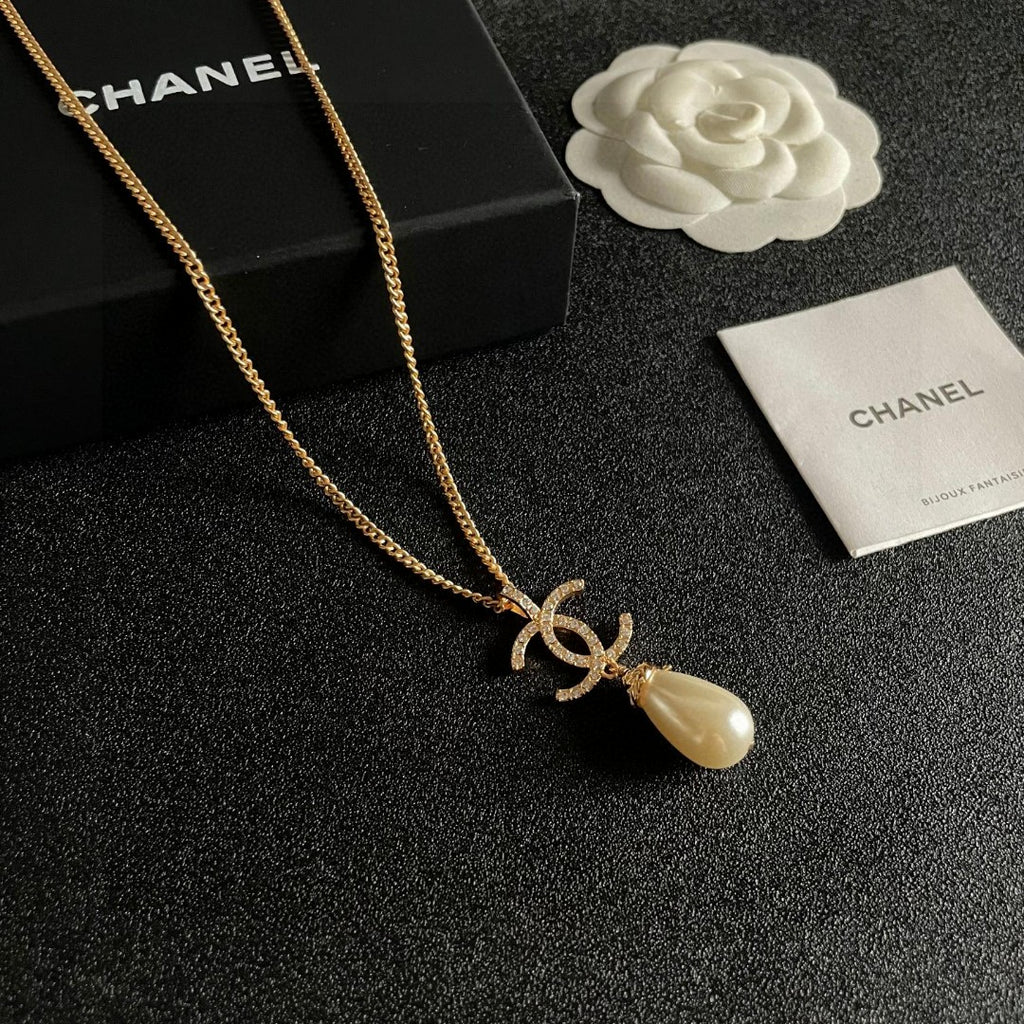 Double-C Emblem Pearl-Detail Pendant Necklace – Pearl Detail – Design 023 styled product view