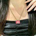 Double-C Emblem Pendant Necklace in Polished Metal-Tone – Design 023 main product view