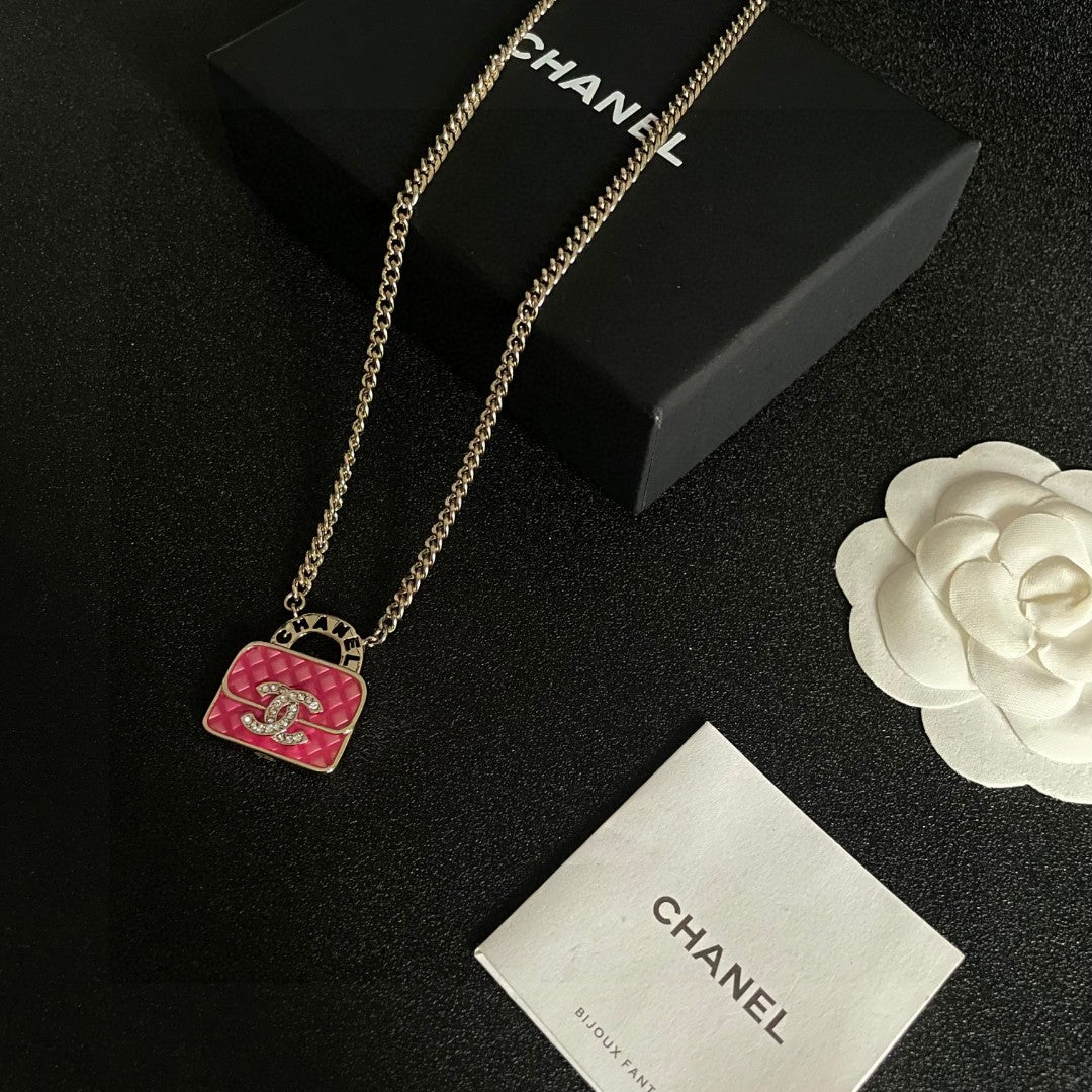 Double-C Emblem Pendant Necklace in Polished Metal-Tone – Design 023 close-up detail