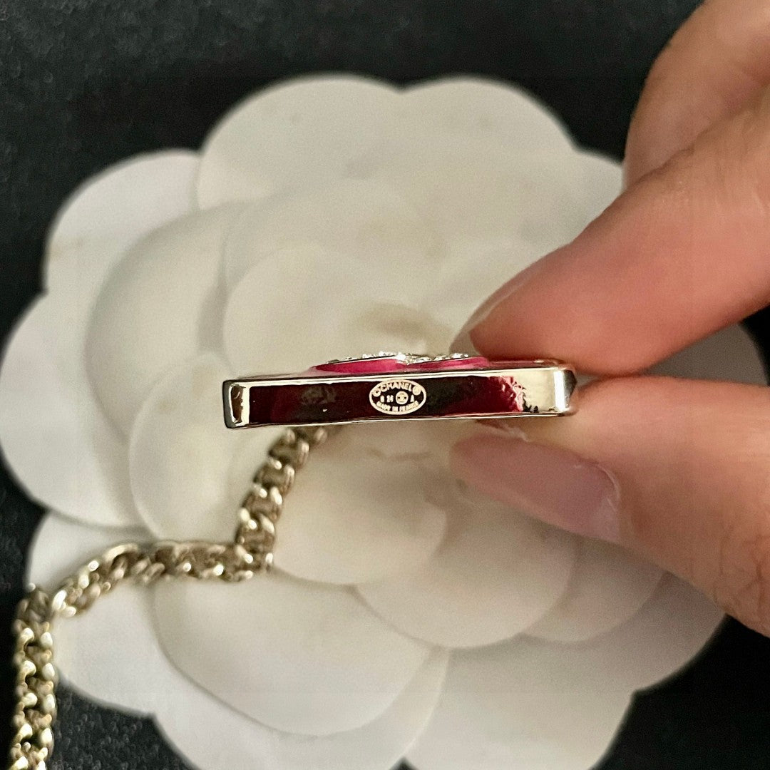 Double-C Emblem Pendant Necklace in Polished Metal-Tone – Design 023 front product view