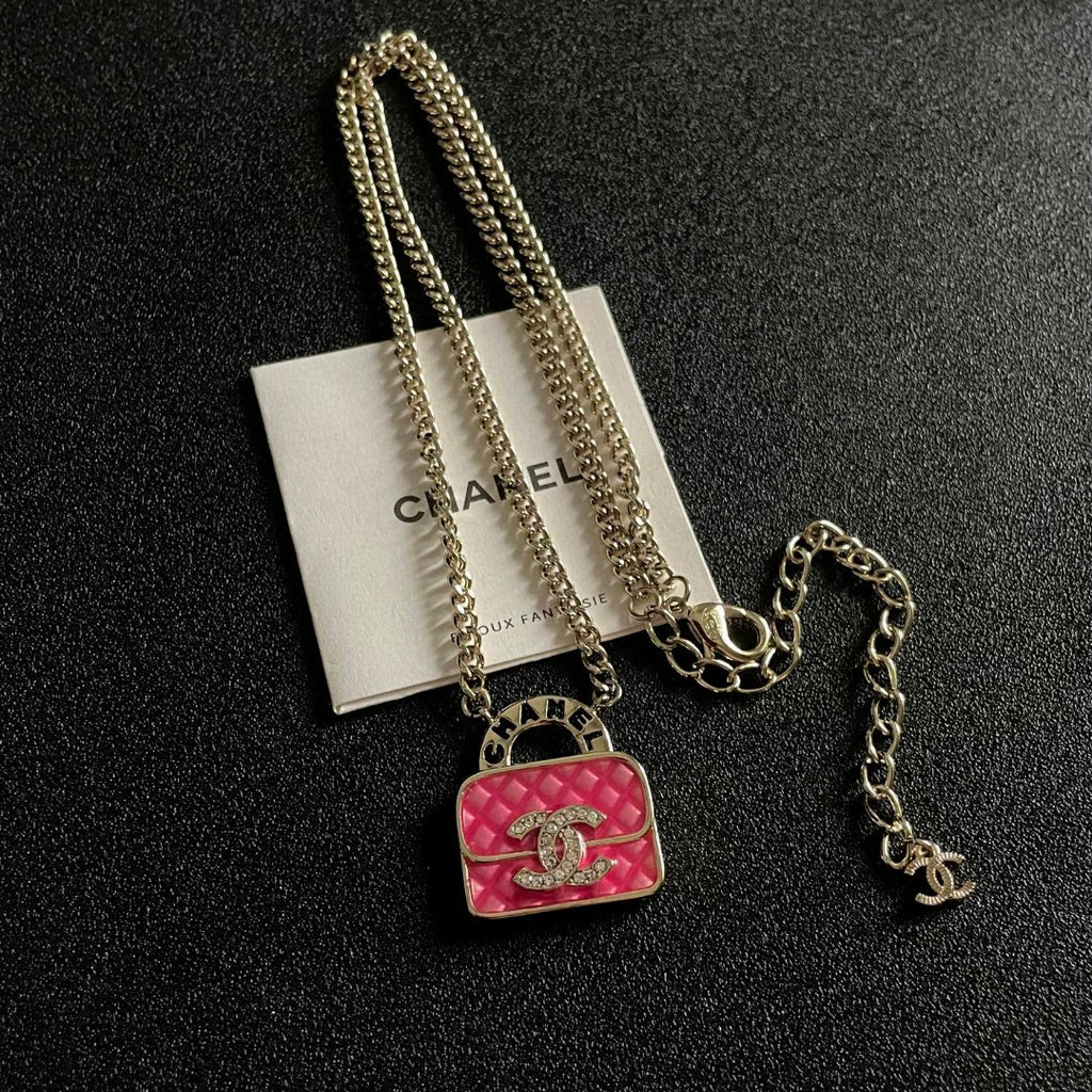 Double-C Emblem Pendant Necklace in Polished Metal-Tone – Design 023 detail view