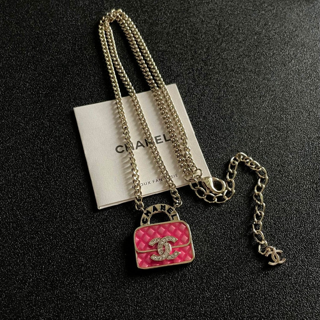 Double-C Emblem Pendant Necklace in Polished Metal-Tone – Design 023 detail view