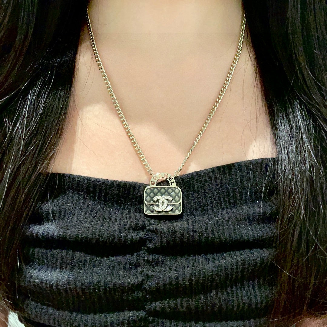 Double-C Emblem Pendant Necklace in Polished Metal-Tone – Design 022 detail view