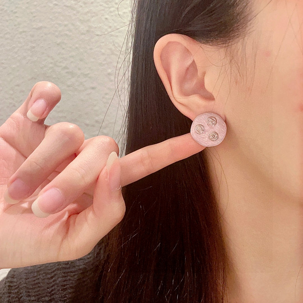 Double-C Emblem Stud Earrings in Polished Metal-Tone – Design 106 front product view