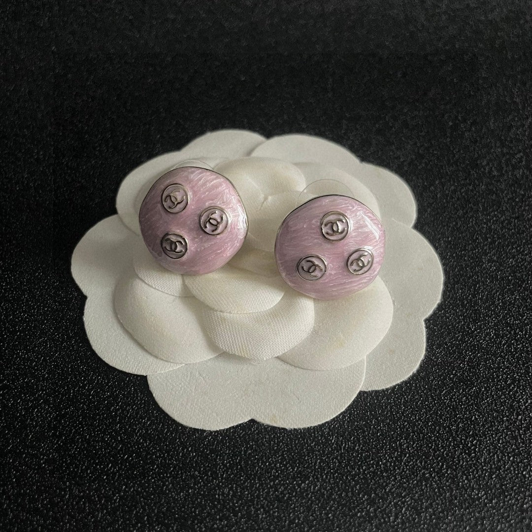 Double-C Emblem Stud Earrings in Polished Metal-Tone – Design 123 front product view
