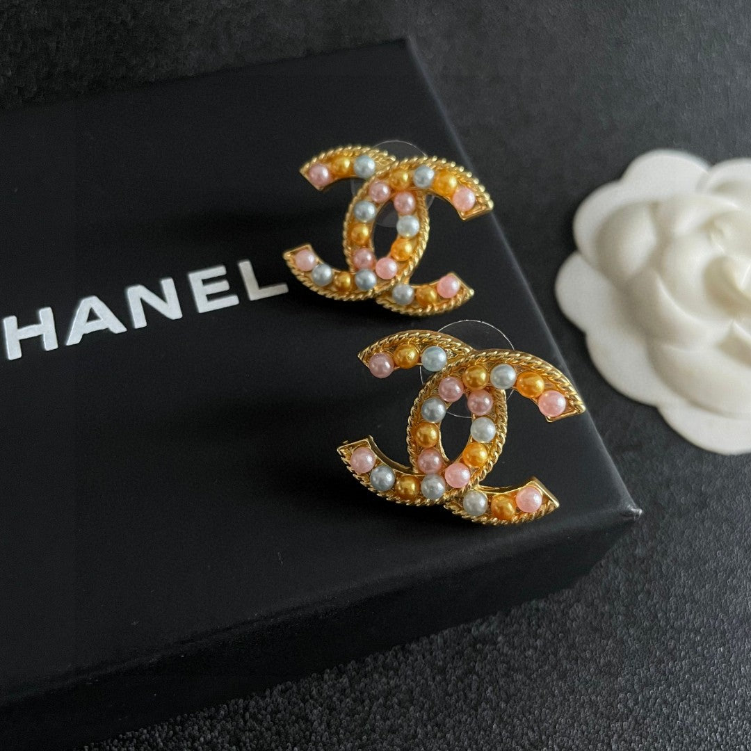 Double-C Emblem Stud Earrings in Polished Metal-Tone – Design 187 detail view