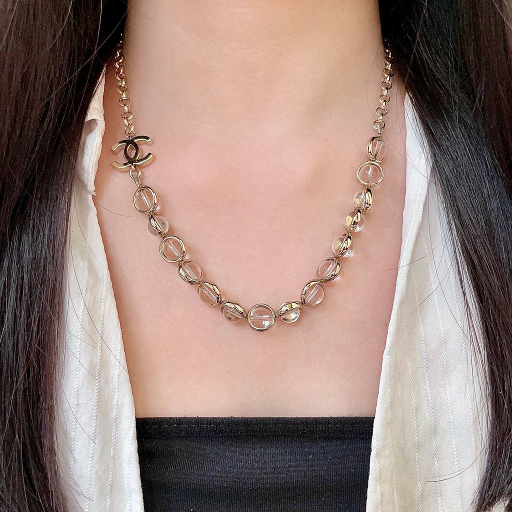 Double-C Emblem Pendant Necklace in Polished Metal-Tone – Design 017 detail view