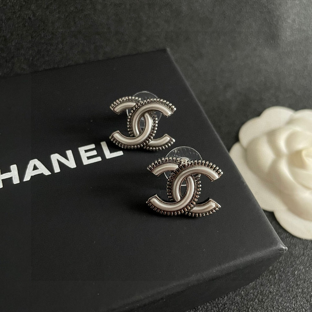 Double-C Emblem Stud Earrings in Polished Metal-Tone – Design 195 detail view