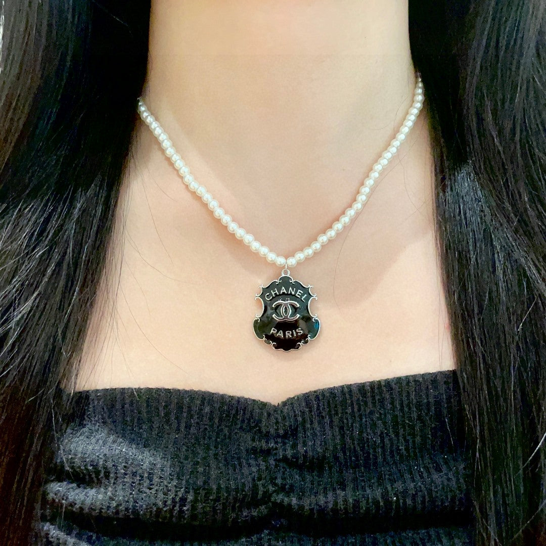 Double-C Emblem Pearl-Detail Pendant Necklace – Pearl Detail – Design 033 detail view