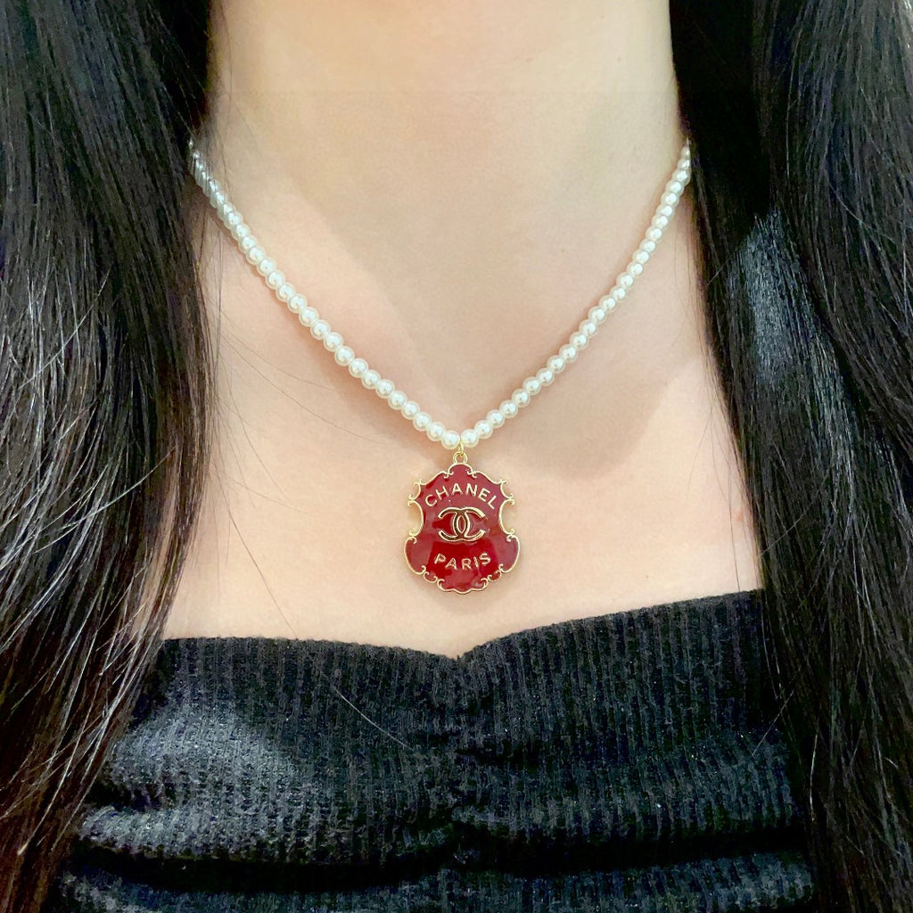 Double-C Emblem Pearl-Detail Pendant Necklace – Pearl Detail – Design 032 detail view